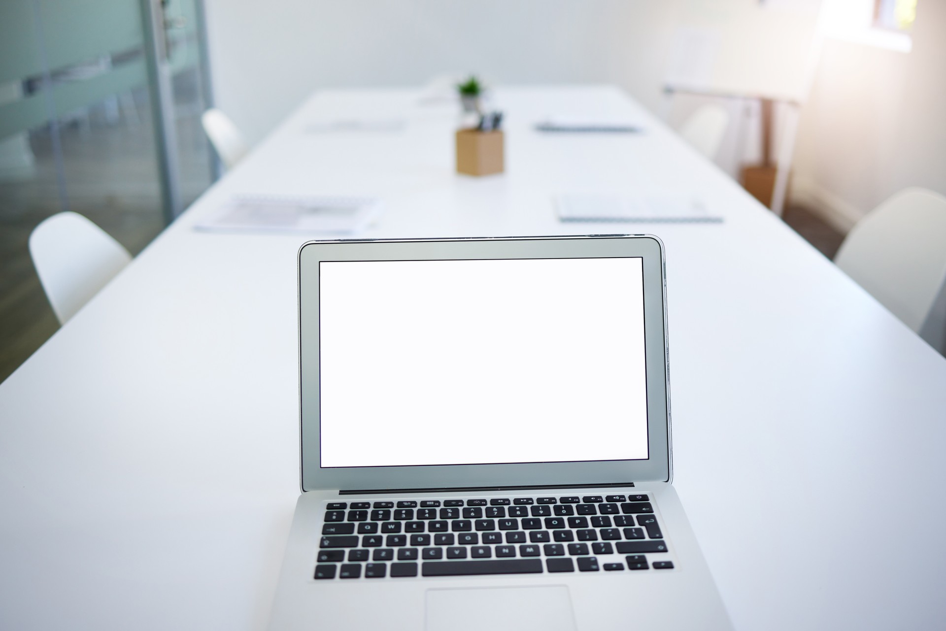 Laptop screen, display or homepage for marketing mockup in boardroom for about us, contact us and faq. Technology, blank and website for analytics, ui and ux for email, web design and information